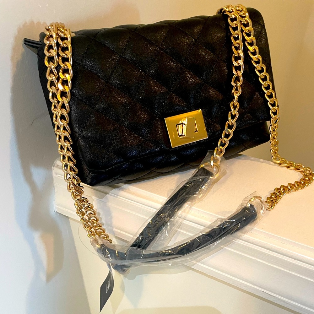 Lovely, roomy, puffy, evening bag.